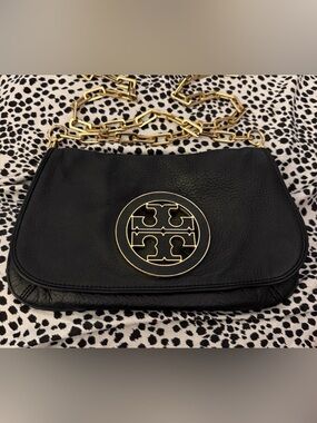 Tory Burch Amanda Reva Black Leather Clutch with Gold Logo and Chain Strap